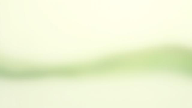 Abstract soothing waveform animation next to a play button, representing guided audio.